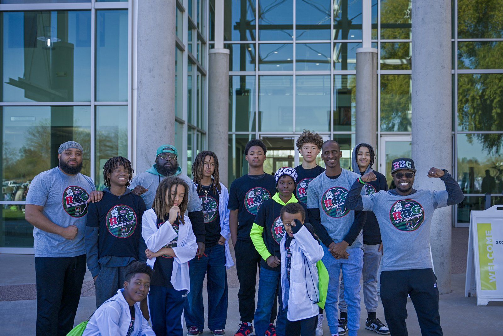 The OBFC group posed outside a summit venue