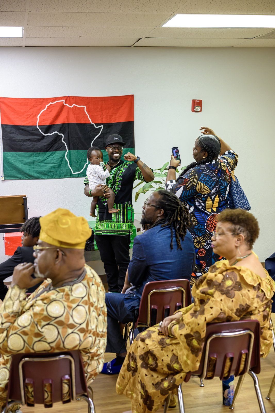 Elders in traditional dress at a cultural ceremony