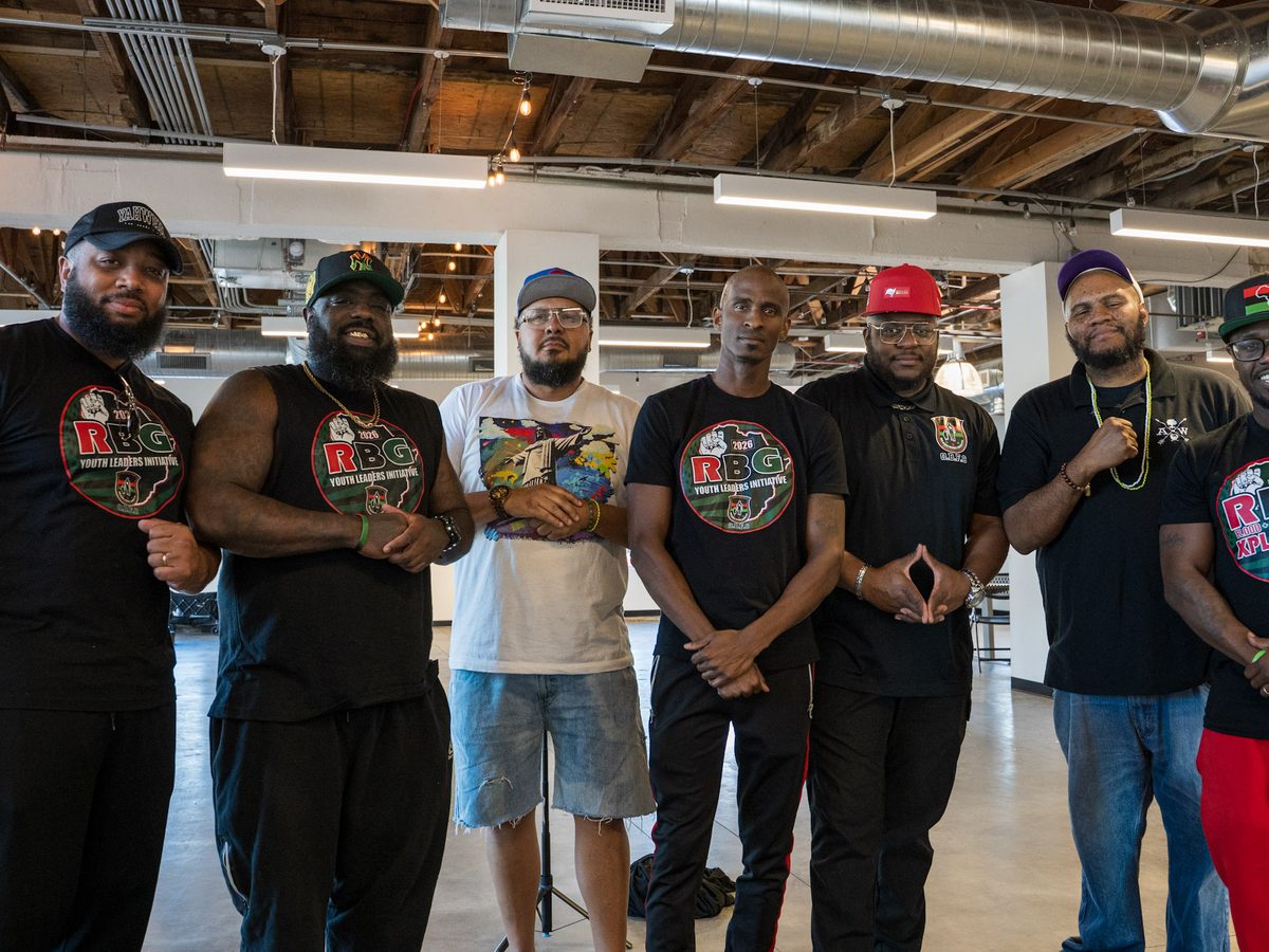 Mentors and fathers of Our Black Fathers Committee standing together.